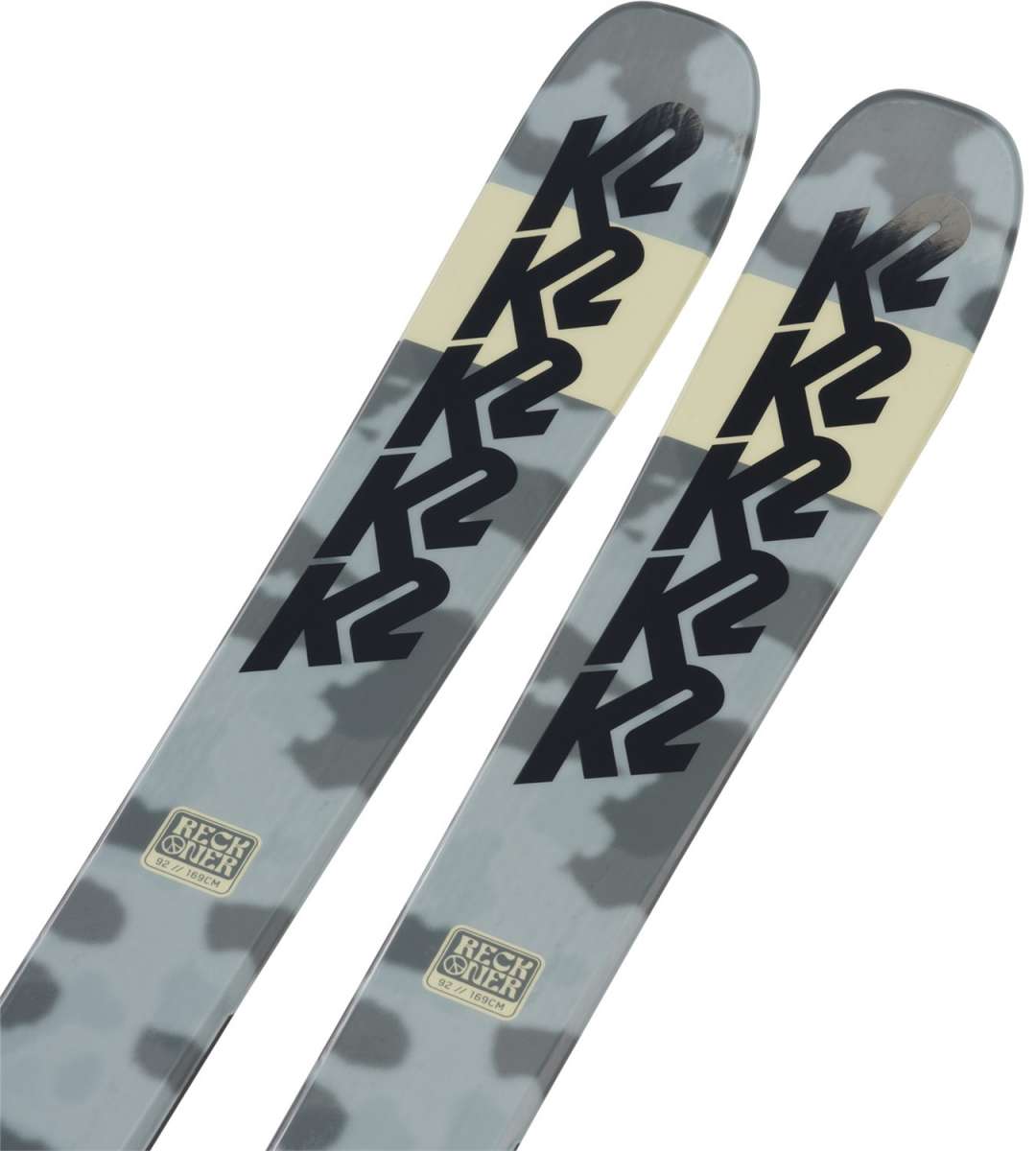 K2 Reckoner 92 skis 2024 feature a distinctive gray and blue graphic design.