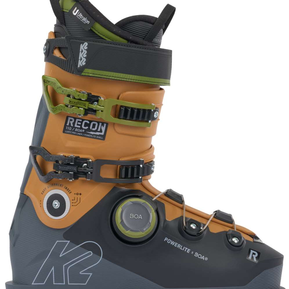 K2 Recon 110 BOA ski boots feature a black and orange design with visible BOA adjustment dials.