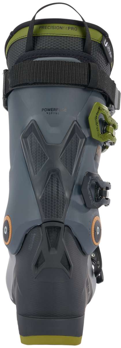 K2 Recon 120 MV ski boots feature a dark gray color with yellow accents and a distinctive design.