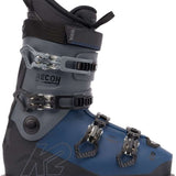 The image shows a pair of K2 Recon 90 MV ski boots for the year 2023. The boots are blue and black with silver buckles, straps, and hardware. They have a sturdy design with multiple adjustment points to ensure a secure fit.
