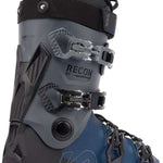 The image shows a pair of K2 Recon 90 MV ski boots for the year 2023. The boots are gray and black, featuring a BOA closure system and a sturdy design suitable for winter sports activities.