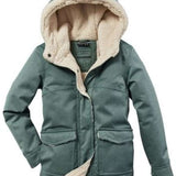 Killtec Junior's Urban Parka With Hood 2022 - A dark green parka with a hood, featuring two front pockets and a zipper closure.