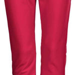 Killtec Women's Jilia Soft Shell Pant 2022-2023 - A pair of women's pink snow pants with a black belt and gray fleece lining visible at the bottom hem.