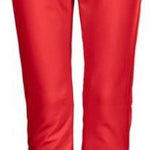 Killtec Ladies Jilia Softshell Pant - A pair of red ski pants with a black waistband and belt loops, featuring a subtle white logo on the left thigh.