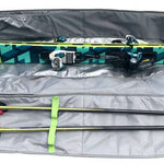 Kulkea Kantaja Ski Bag 2022-2023 - A black ski bag with a blue and green geometric pattern on the front, featuring two zippered compartments and a handle for easy carrying.