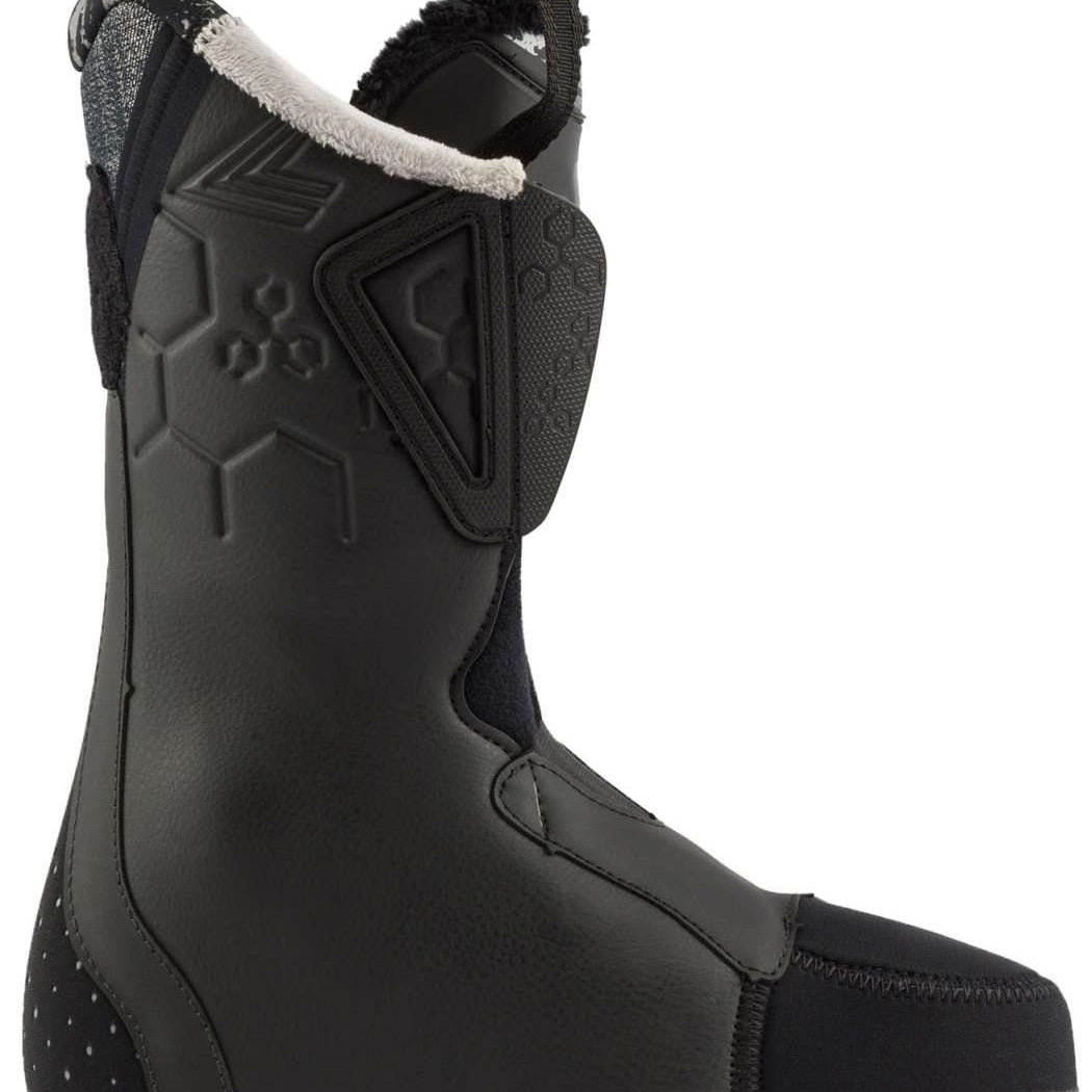Lange Women's Shadow 85 LV Ski Boots 2024 - Black ski boots with a textured pattern on the side and a white fur trim around the top edge.