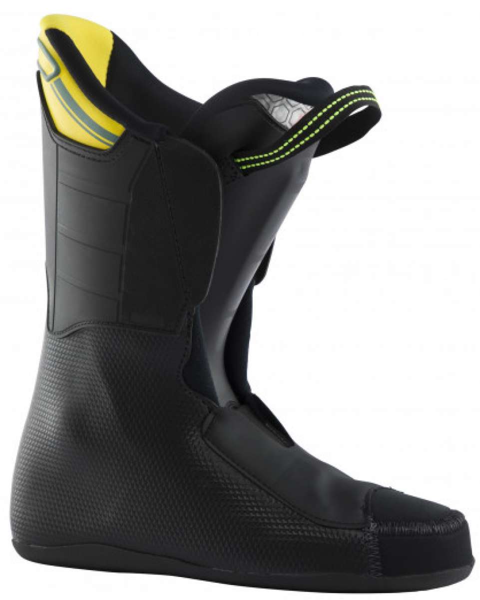 Lange RX 110 MV Ski Boot 2023 - A black ski boot with yellow accents on the heel and tongue.