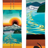 Lib Tech Women's Glider Snowboard 2024 - A snowboard with a colorful design featuring a mountain and sun in shades of orange, yellow, blue, green, white, and black.