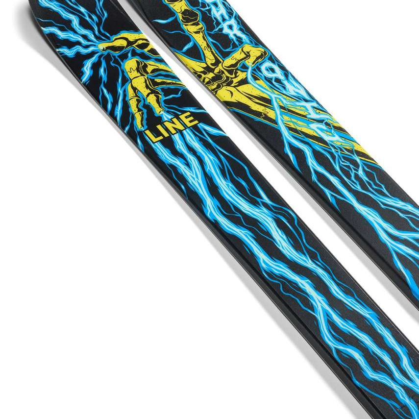 Line Chronic 101 Skis 2024 - Black skis with a yellow graphic of a skeleton hand holding a ski pole.