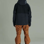 Liquid Anton Pro Stretch Jacket 2022-2023 - A black jacket with a high collar and zippered pockets on either side.