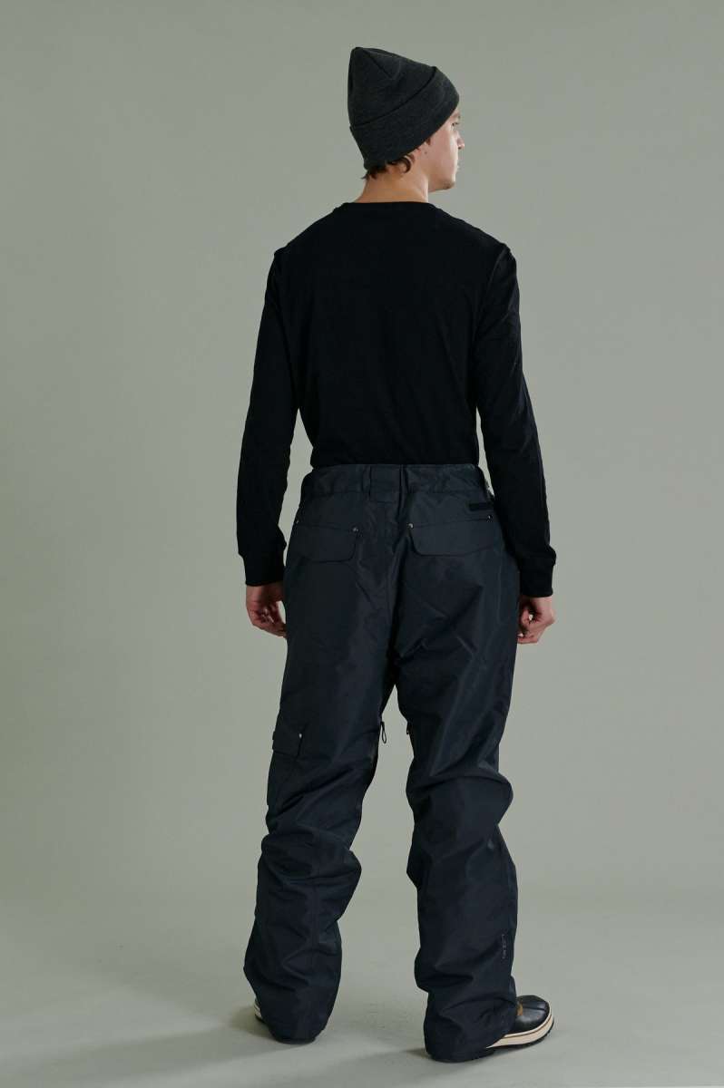 Liquid Express Insulated Pants - Black insulated ski pants with zippered pockets and adjustable cuffs.