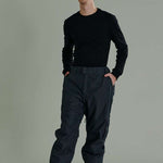 Liquid Express Insulated Pants - Black insulated ski pants with zippered pockets and adjustable cuffs.