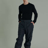 Liquid Express Insulated Pants - Black insulated ski pants with zippered pockets and adjustable cuffs.