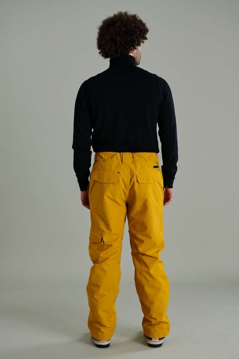 Liquid Express Insulated Pants - Black insulated pants with zippered pockets on each thigh and a black zipper at the ankle.