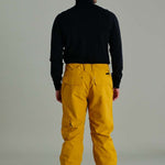 Liquid Express Insulated Pants - Black insulated pants with zippered pockets on each thigh and a black zipper at the ankle.