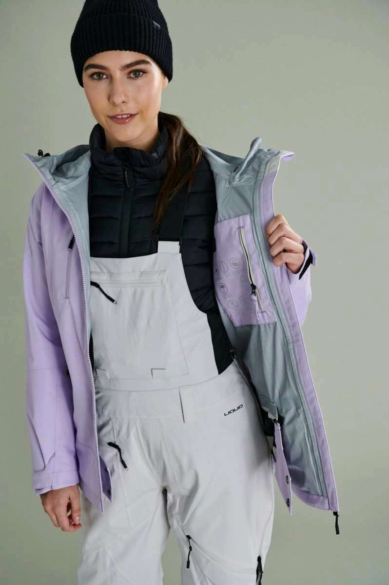 Liquid Women's Atna Pro 3 Layer Jacket - Light purple jacket with black zipper and two zippered pockets on front.
