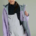 Liquid Women's Atna Pro 3 Layer Jacket - Light purple jacket with black zipper and two zippered pockets on front.