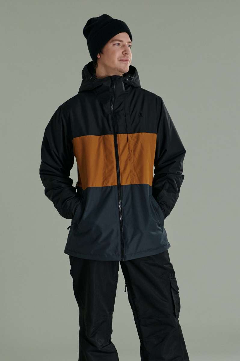 Liquid Maverick Insulated Jacket - A black jacket with a brown stripe across the chest and upper back.