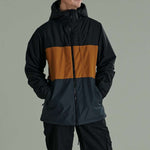 Liquid Maverick Insulated Jacket - A black jacket with a brown stripe across the chest and upper back.