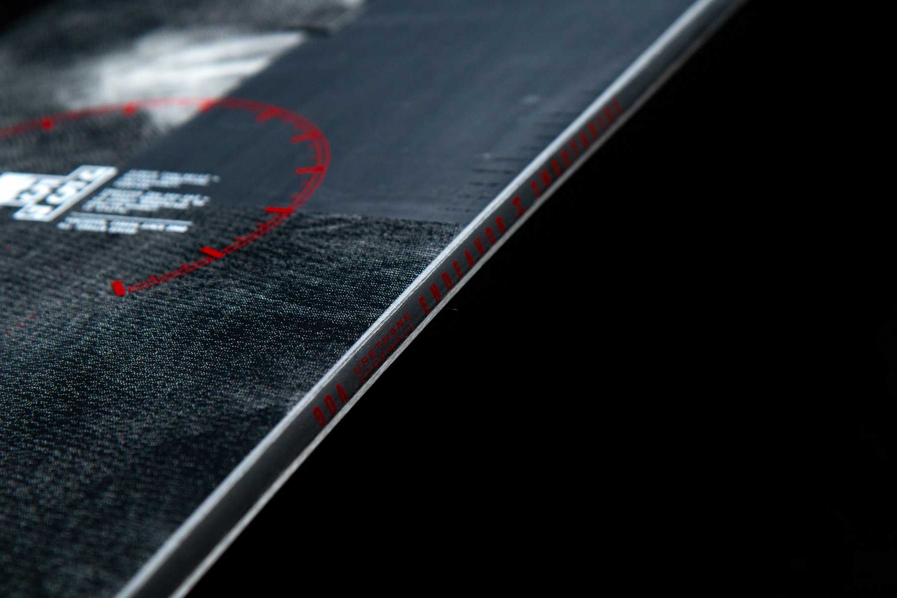 Endeavor Live Snowboard 2020 - Black snowboard with white logo on top left corner and red text along bottom edge.