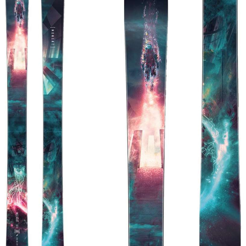 Moment Wildcat 101 Skis 2024 - A black ski with a white logo and text on top, featuring a pink and blue abstract design.