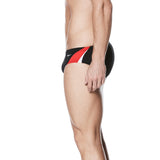 Nike Swim Men's Poly Color Surge Brief Swimsuit - A black brief swimsuit with a red and white diagonal stripe on the front.