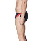 Nike Swim Men's Poly Color Surge Brief Swimsuit - A red, white and blue brief swimsuit with a Nike logo on the left hip.