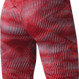 Nike Swim Men's Vibe Jammer Swimsuit - A red and black swimsuit with a geometric pattern of lines on the fabric, featuring a solid color background.