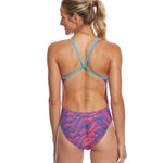 Nike Swim Ladies' Far Out Cut-Out Tank One-Piece Swimsuit - A pink and blue one-piece swimsuit with cut-out details on the sides, featuring a tank-style top.