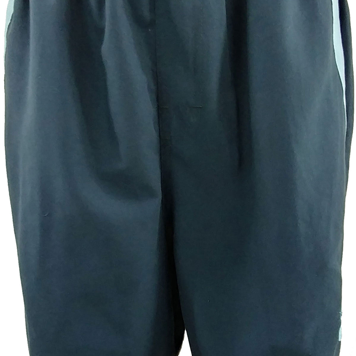 Nike Men's Core 9" Spliced Cargo Swim Shorts - A pair of men's swim shorts with a spliced design and cargo pockets, featuring a solid color scheme.