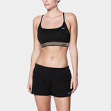 Nike Swim Ladies' Solid Element Board Shorts Bottom Two-Piece Swimsuit - A black two-piece swimsuit with a solid pattern, featuring Nike's iconic swoosh logo on the left hip of the shorts.