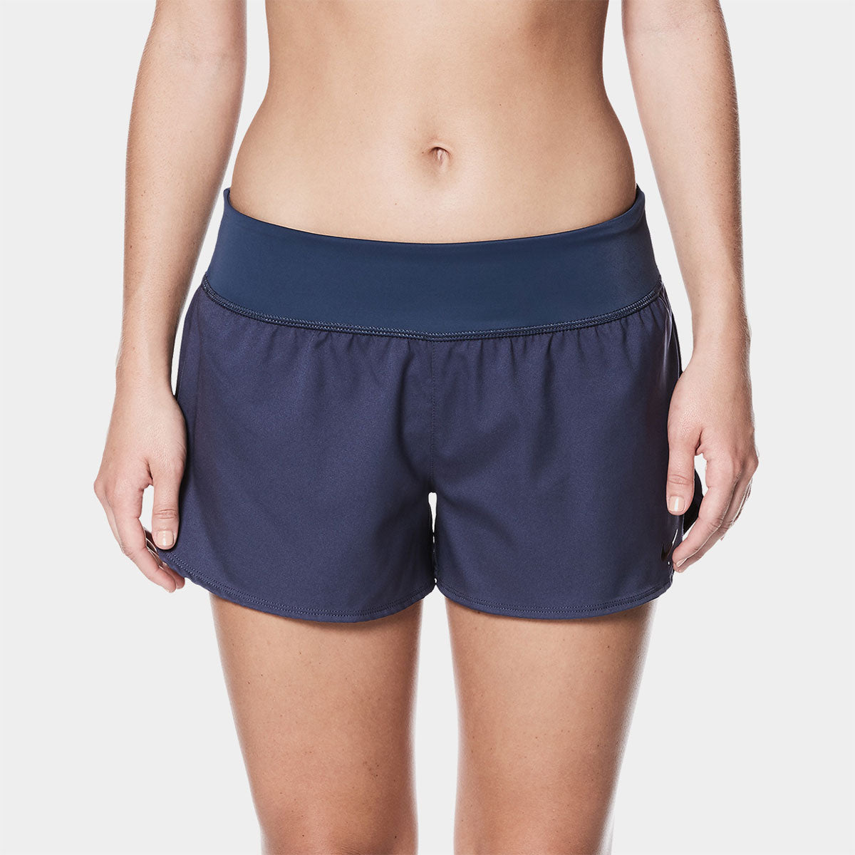 Nike Swim Ladies' Solid Element Board Shorts Bottom Two-Piece Swimsuit - A pair of navy blue swim shorts with a solid color design and an elastic waistband.