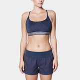 Nike Swim Ladies' Solid Element Board Shorts Bottom Two-Piece Swimsuit - A two-piece swimsuit with a solid-colored pair of board shorts and a matching top.