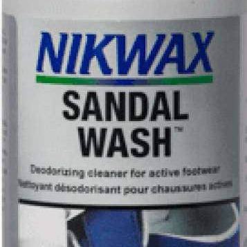 Nikwax Sandal Wash - A white bottle with a green cap and blue lettering on the label.
