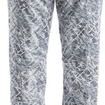 NILS Ladies Megeve Insulated Print Pant 2022-2023 - A pair of women's insulated snow pants with a gray and white abstract print pattern.