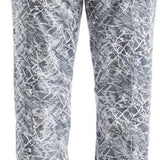 NILS Ladies Megeve Insulated Print Pant 2022-2023 - A pair of women's insulated snow pants with a gray and white abstract print pattern.