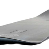 Nitro Magnum Snowboard 2024 - A black snowboard with a white logo on top, featuring a wavy pattern and a glossy finish.