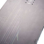 Nitro Magnum Snowboard 2024 - A black snowboard with a subtle wood grain pattern on its surface.