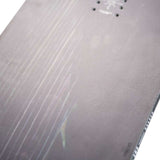 Nitro Magnum Snowboard 2024 - A black snowboard with a subtle wood grain pattern on its surface.