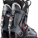 Nordica HF 110 Ski Boots 2024 - Black ski boots with silver buckles and red accents on the side.