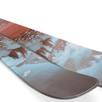 Nordica Ladies Santa Ana 104 Free Skis 2024 - A pair of skis with a brown and white color scheme, featuring a distinctive pattern on the top sheet.