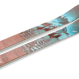 Nordica Ladies Santa Ana 104 Free Skis 2024 - A pair of skis with a light blue graphic featuring trees and mountains on a white background.