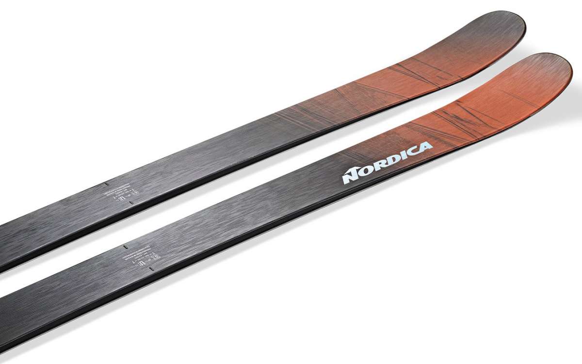 Nordica Unleashed 90 Ice Skis 2024 - A pair of skis with a black and red color scheme, featuring a distinctive wood grain pattern on their topsides.