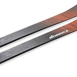 Nordica Unleashed 90 Ice Skis 2024 - A pair of skis with a black and red color scheme, featuring a distinctive wood grain pattern on their topsides.