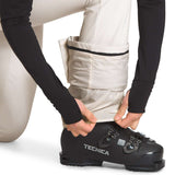 North Face Amy Softshell Pant Short 2022-2023 - A pair of khaki-colored pants with a black stripe at the waistband, worn by a model from behind.