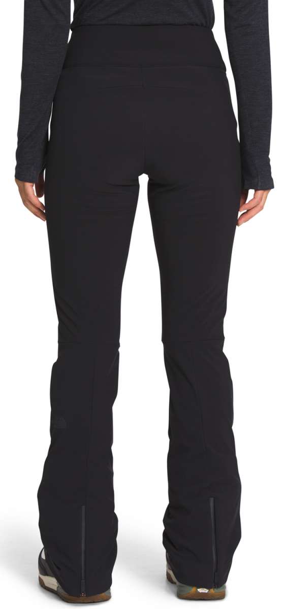 North Face Amy Softshell Pant Short - Black pants with a subtle sheen, featuring a zippered pocket on the right thigh and a slightly flared leg.