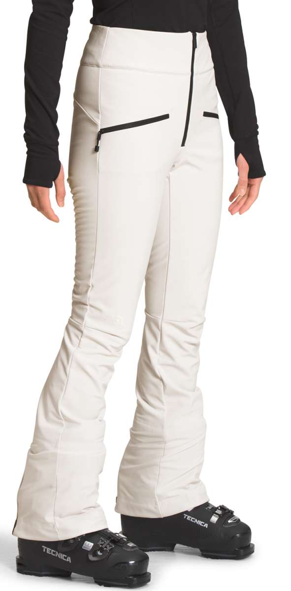 North Face Amy Softshell Pant Short 2022-2023 - A pair of white snow pants with a black zipper on the left side, featuring a zippered pocket and a small black logo near the right hip.
