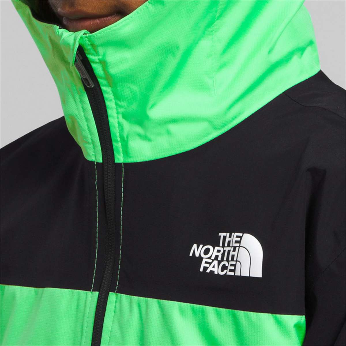 North Face Boys Freedom Triclimate Jacket 2024 - A black and green jacket with a white logo on the left chest.