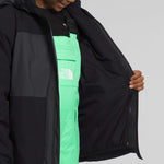 North Face Boys Freedom Triclimate Jacket 2024 - A black jacket with a white logo on the chest.
