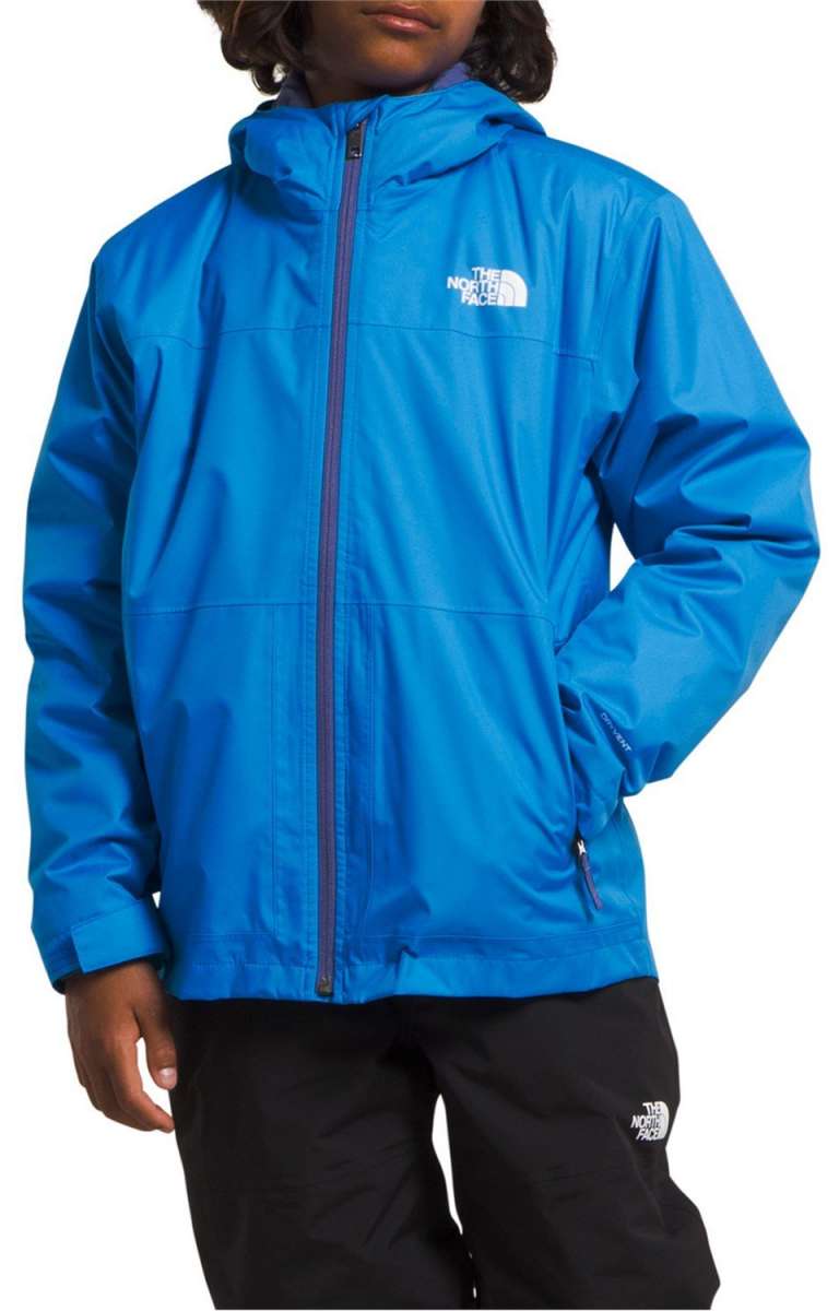 North Face Boys Freedom Triclimate Jacket 2024 - A blue jacket with a white logo on the left chest and a zipper down the front.